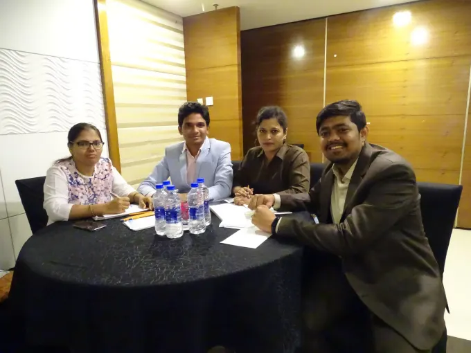 Four ORNET staff at a meeting table